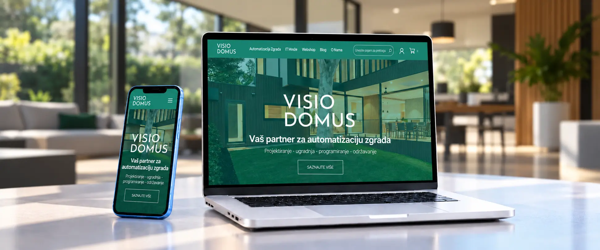 Visio Domus prikazana na laptopu i mobitelu.